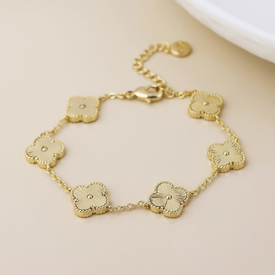Faux gold quatrefoil station bracelet