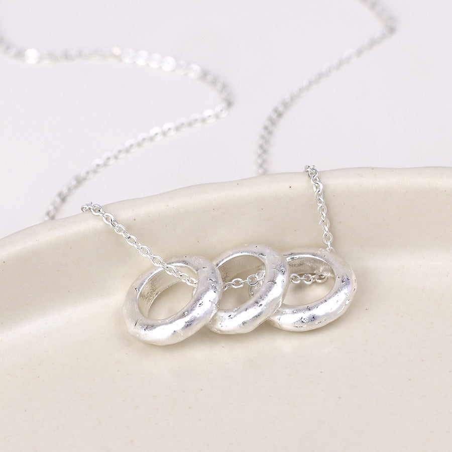 Molten triple ring necklace-worn silver
