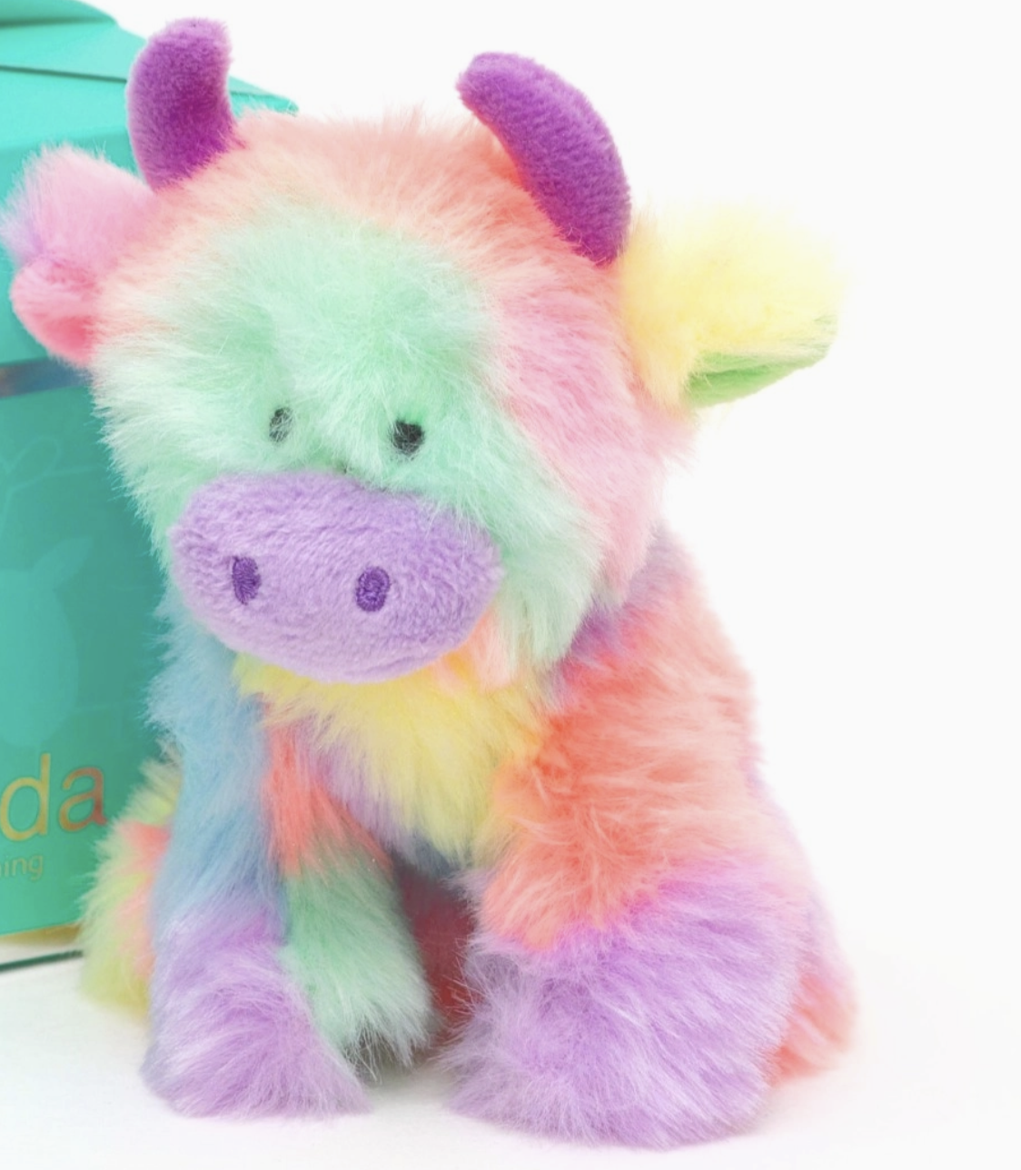 Mini rainbow highland cow
