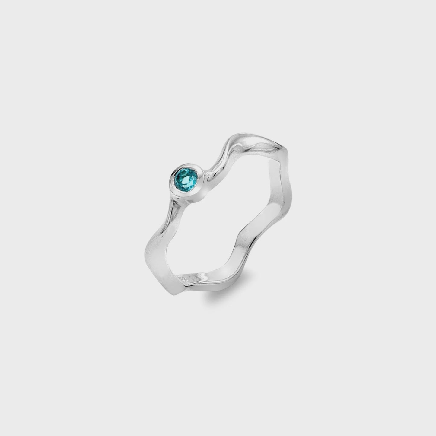 Water ripples blue topaz ring