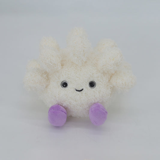 Coral soft toy with purple feet