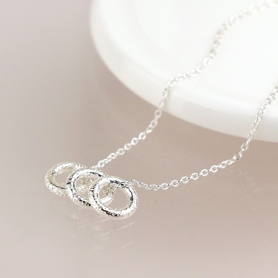 Sterling silver tiny rings necklace
